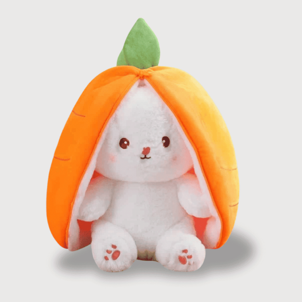 Doudou Lapin Carotte 18 cm : Doudou lapin blanc caché dans une carotte orange avec feuille verte.