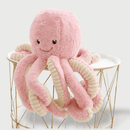Doudou Poulpe Rose en Coton 18 cm : Doudou poulpe rose avec tentacules en coton ondulé et un visage souriant.