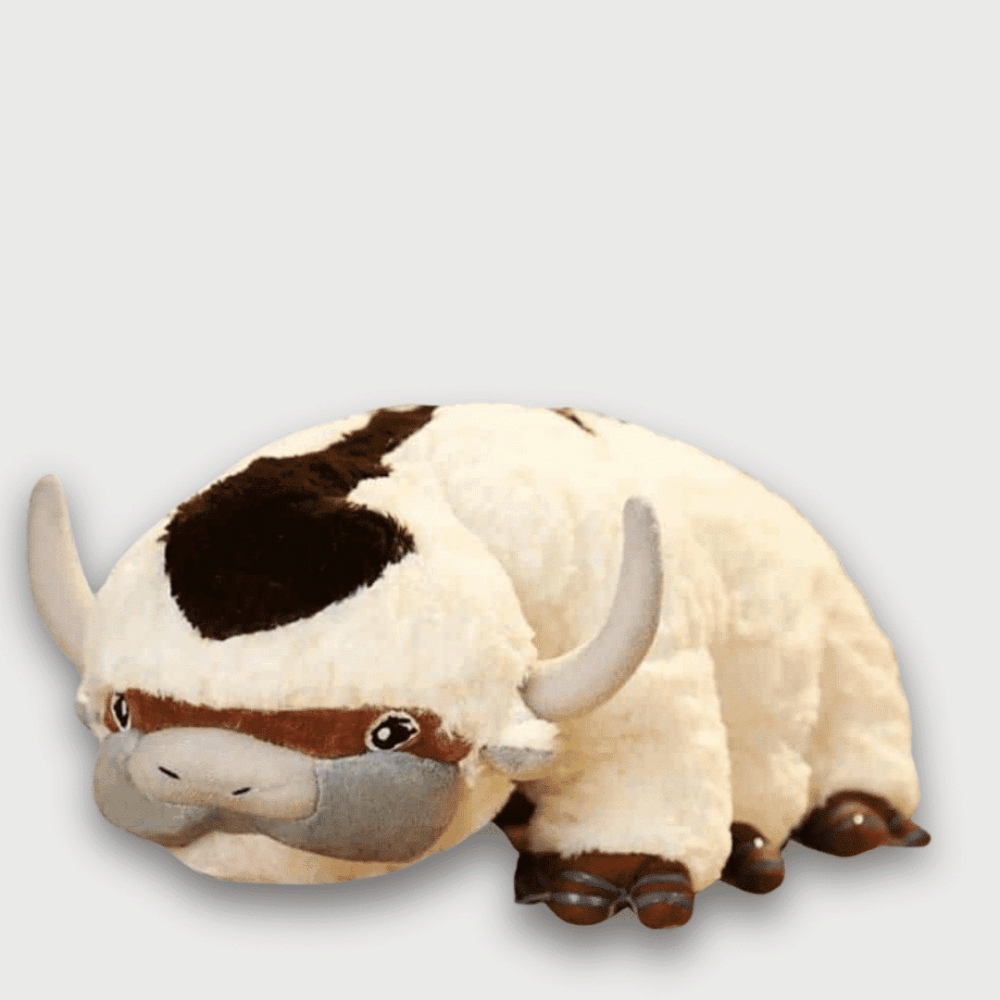 Doudou Vache Taureau Kawaii 55 cm : Un doudou vache taureau beige avec des cornes et des taches brunes.