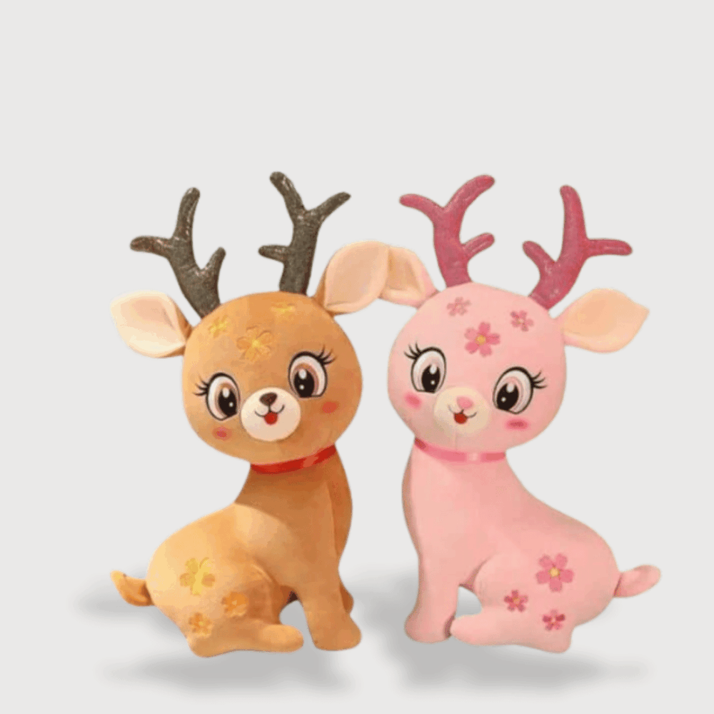 Doudou Biche de Noël Super Mignonne : Deux doudous biches, l'un brun avec des cornes marron et l'autre rose avec des cornes roses scintillantes, chacun orné de fleurs.
