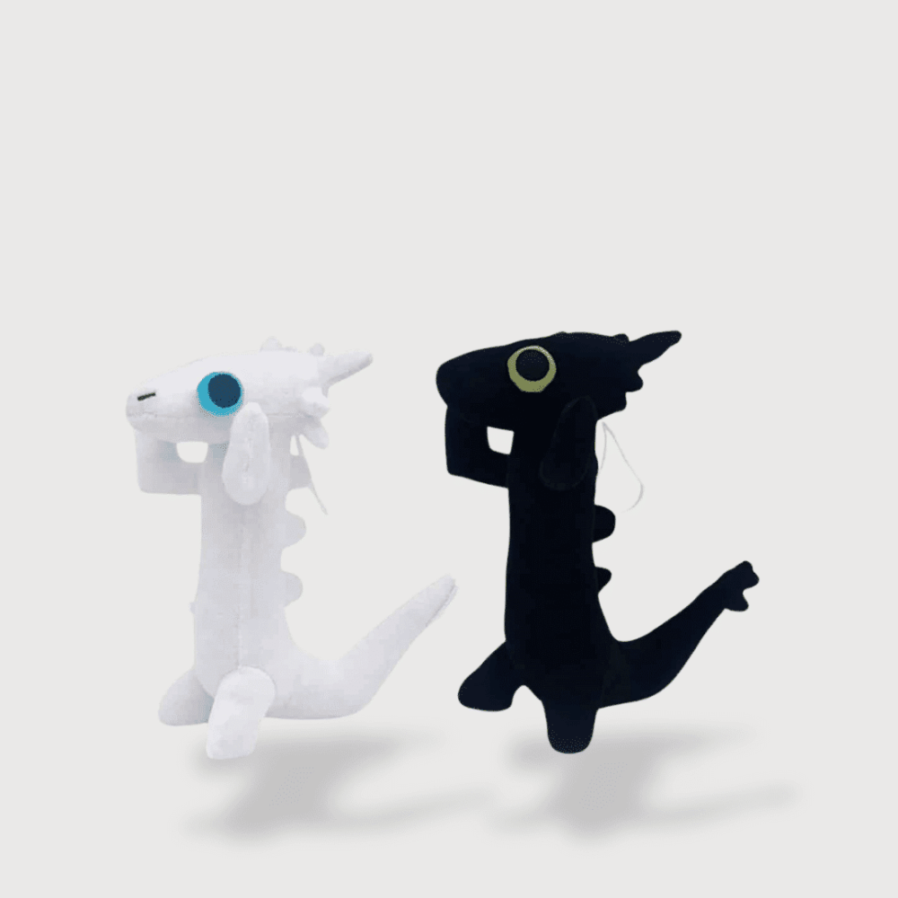 Doudou Dragon Dansant Édenté avec deux dragons noir et blanc debout aux grands yeux colorés.