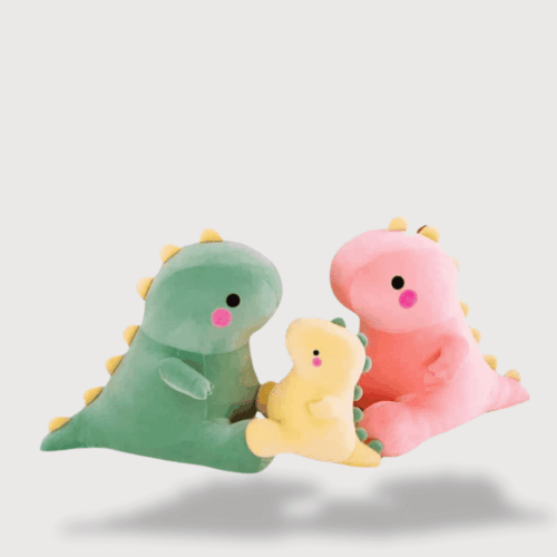 Doudou Dinosaure Trop Mignon : Famille de dinosaures en vert, rose et jaune, avec des joues roses.