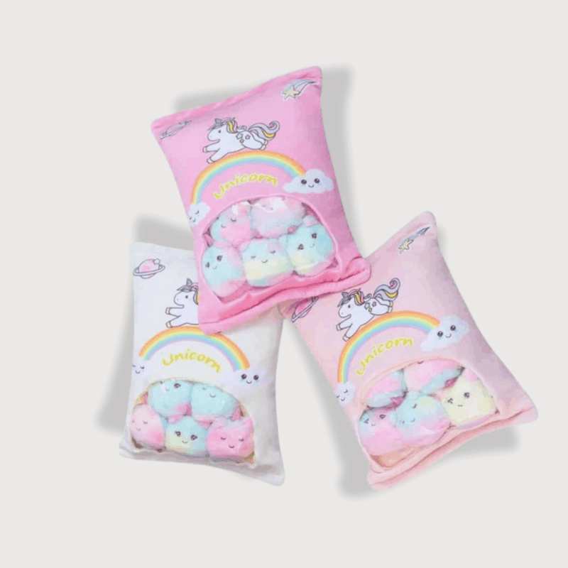 Doudou Licorne Lot de 5, avec trois sachets roses et blancs contenant cinq petites licornes kawaii.