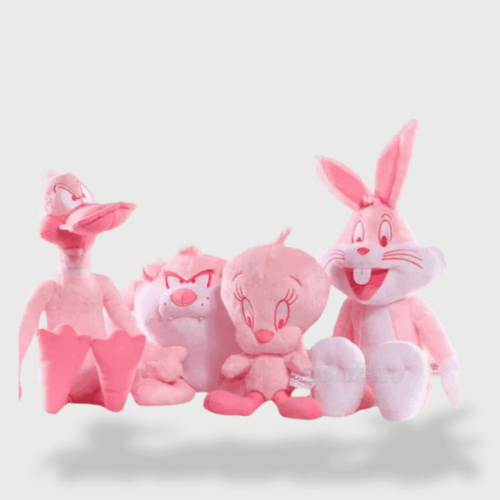 Doudou Rose Titi et ses Amis Looney Tunes comprenant Titi, Bugs Bunny, Daffy Duck et Sylvestre en version rose pastel.