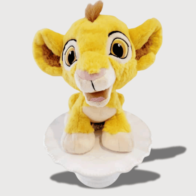 Doudou Simba Mini et Doux 23 cm, du Roi Lion, avec un sourire joyeux et des oreilles adorables.