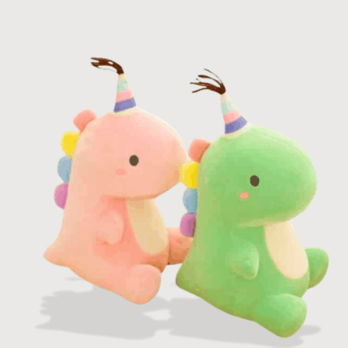 Doudou Dinosaure Mini Kawaii, deux petits dinosaures pastel rose et vert au look mignon et festif.