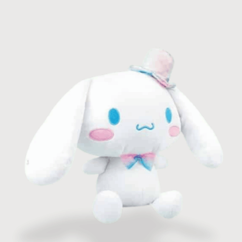 Doudou Peluche Cinnamoroll Très Douce : Un doudou Cinnamoroll blanc avec de grandes oreilles et un chapeau élégant rose et bleu.