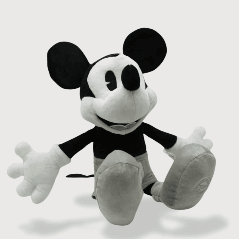Doudou Mickey Style Vintage 45 cm : Un doudou Mickey en noir et blanc, avec un look rétro, un grand sourire et des gants blancs.