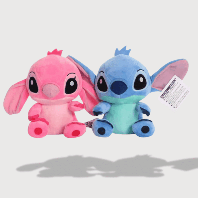 Doudou Disney Stitch Très Doux : Deux doudous Stitch et Angel aux couleurs vives, rose et bleu, en tissu ultra-doux.