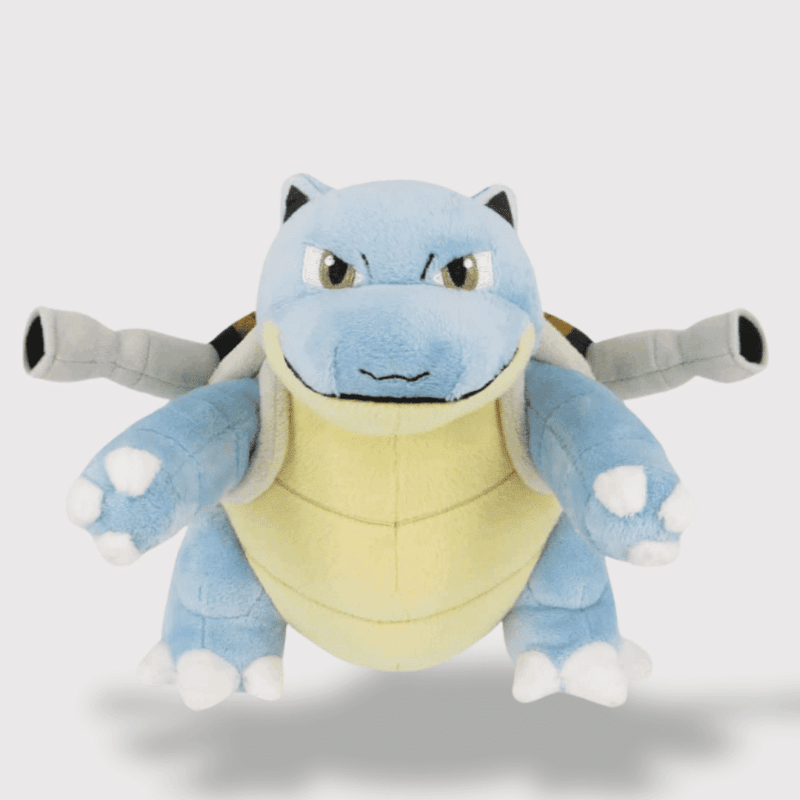 Doudou Pokemon Tortank : Un doudou Tortank bleu avec une carapace beige, deux canons sur le dos et un regard déterminé.