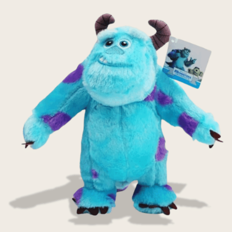 Doudou Disney Sully du Monstre et Cie : Doudou Sully bleu avec des tâches violettes et des cornes.