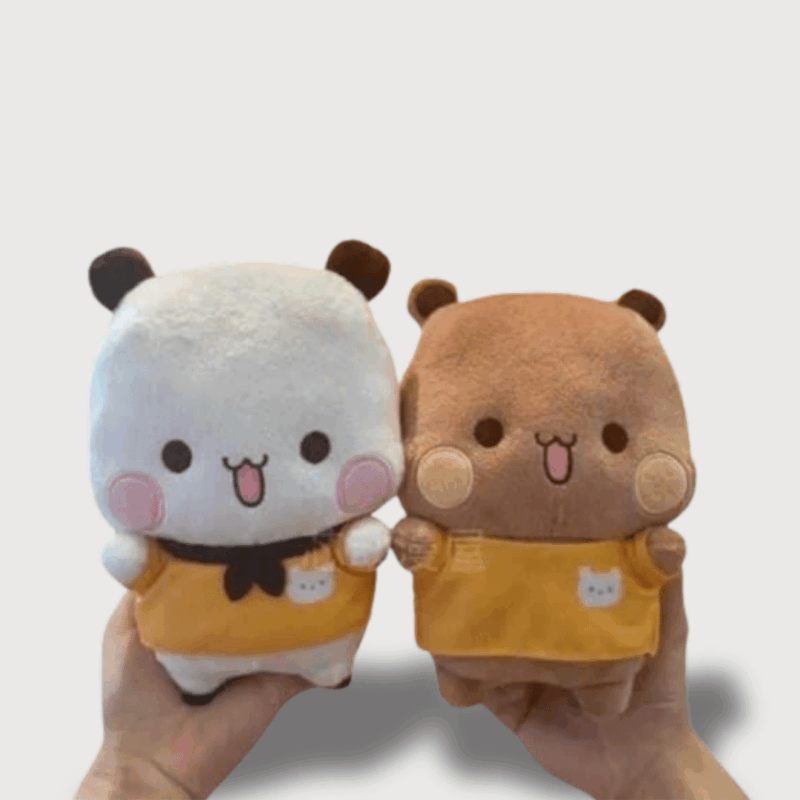 Doudou Panda Bubu et Dudu : Deux adorables doudous pandas, l’un blanc et l’autre marron.
