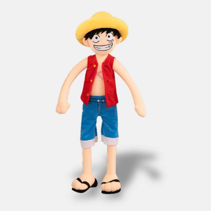Peluche One Piece Luffy avec sa tenue gilet rouge, short jean et chapeau jaune