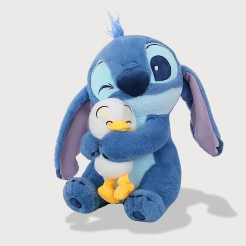 Peluche Stitch avec Caneton mignon, peluche disney stitch bleu fait clin d'oeil et tient caneton blanc