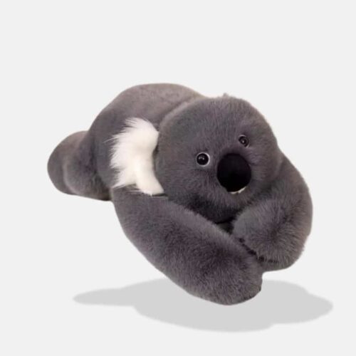 Peluche Koala Allongée de couleur gris foncé avec une petite pelage blanche, koala en peluche